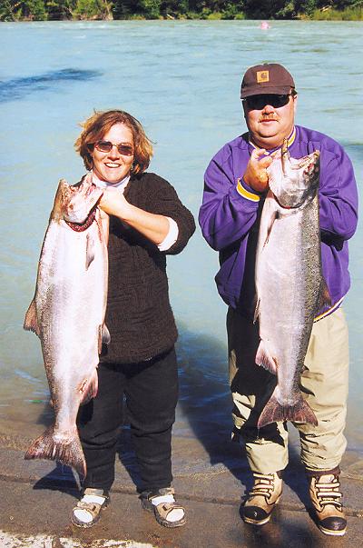 Fishgal and our pal Bear with a pair of Kasilof kings ... guess who wins big fish of the day again??