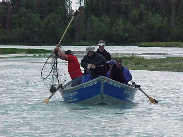 Guide Steve Poitry brings aboard a July king for one of our guests.