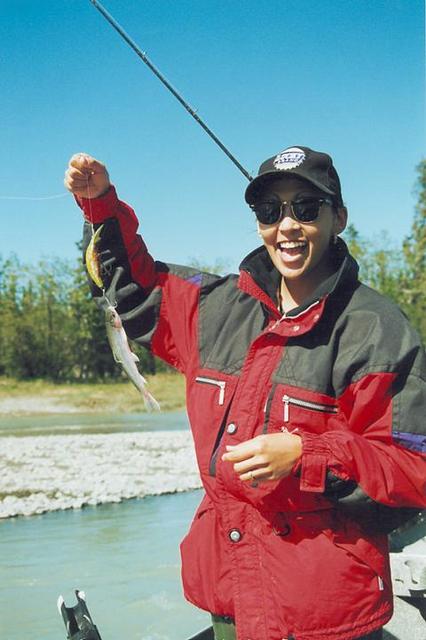 Locals know how to catch the big ones ... Diana shows off a whopper!