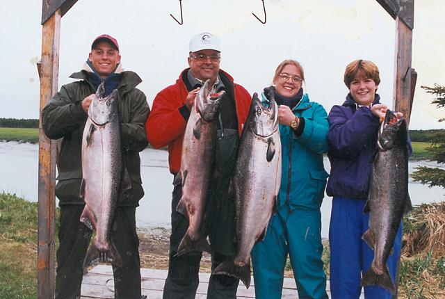 The end of a typical day of June king fishing on the Kasilof ... lots of smiles and a load of kings!