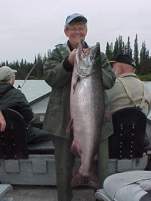 "Momma Peg" of Deal's Den B&B in Kasilof shows off another Kasilof king salmon.