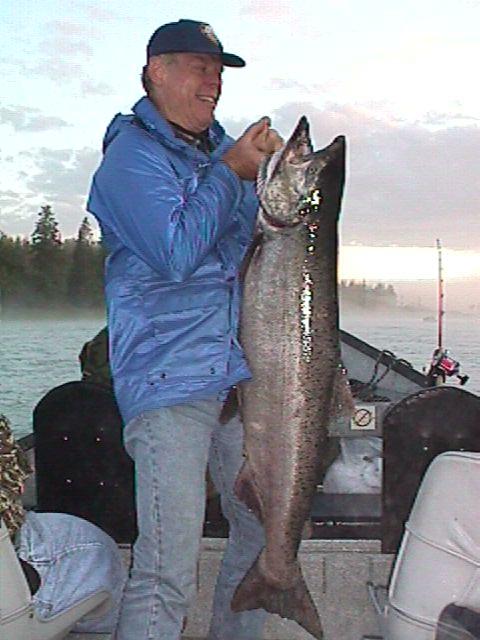 Early morning fog over the river and a July king slamon.