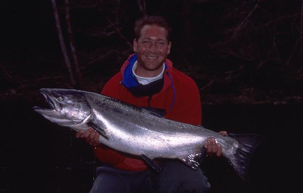Deeply tanned from one of those skiing trips, Bob shows off a late March springer from the Sol Duc River.