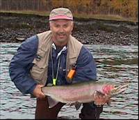 Ha ... an ugly guy with a pretty fish!