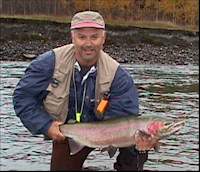 Ha ... an ugly guy with a pretty fish!