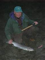 Jim, still asleep in the darkness, with his first fish.