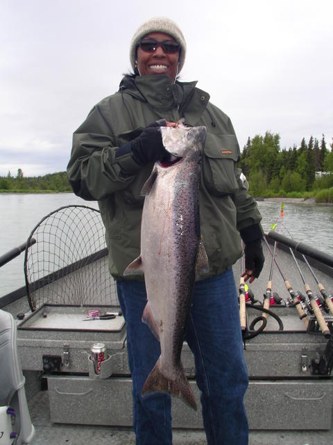 A pretty face we see in both of our fisheries, Vonda shows off her first Alaskan king salmon.